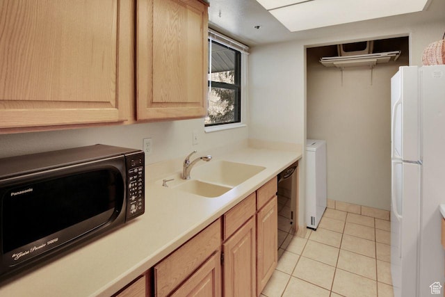 7065 N 2200 W Unit 2W, Summit Park, UT 84098 - kitchen with light brown cabinetry, a sink, black dishwasher, freestanding refrigerator, and light tile patterned floors