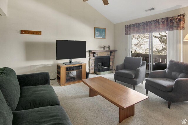 7065 N 2200 W Unit 2W, Summit Park, UT 84098 - carpeted living area with visible vents, high vaulted ceiling, a ceiling fan, radiator heating unit, and a fireplace