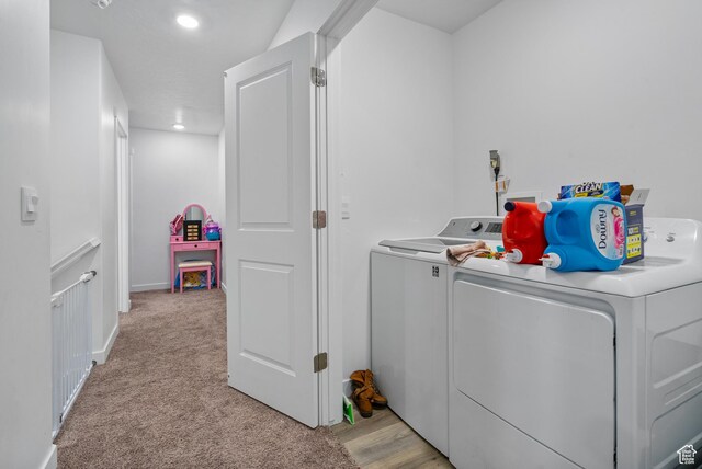 1027 E Reef Dr, Saratoga Springs, UT 84045 - clothes washing area featuring washing machine and clothes dryer, laundry area, and light colored carpet