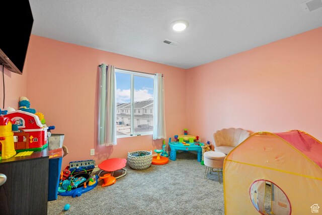 1027 E Reef Dr, Saratoga Springs, UT 84045 - recreation room featuring visible vents and carpet floors