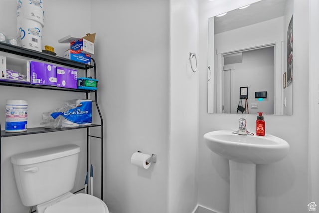 1027 E Reef Dr, Saratoga Springs, UT 84045 - half bathroom with toilet and a sink