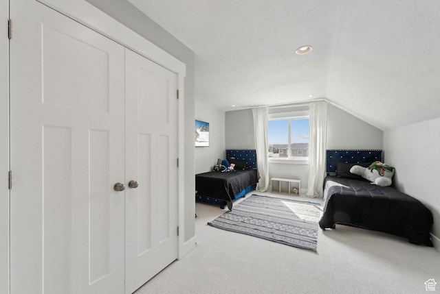9227 N Horizon Dr, Eagle Mountain, UT 84005 - carpeted bedroom featuring lofted ceiling, recessed lighting, and a textured ceiling
