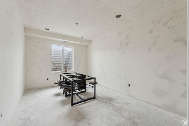 9227 N Horizon Dr, Eagle Mountain, UT 84005 - interior space with concrete flooring and a textured ceiling