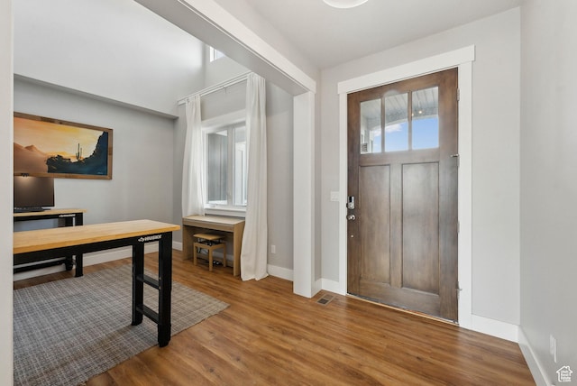 9227 N Horizon Dr, Eagle Mountain, UT 84005 - entryway with visible vents, baseboards, and wood finished floors