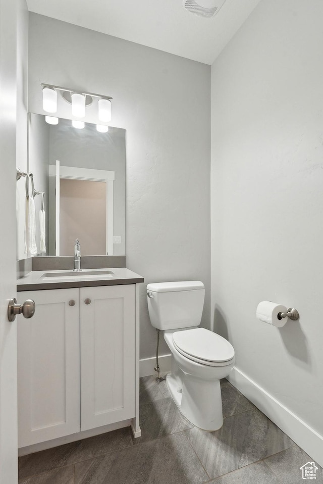 9227 N Horizon Dr, Eagle Mountain, UT 84005 - bathroom with baseboards, toilet, and vanity