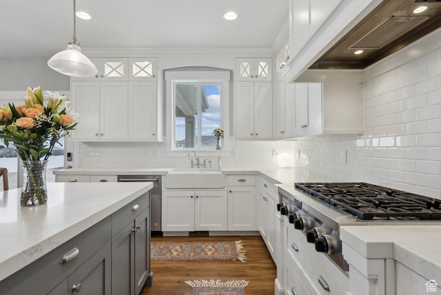 9227 N Horizon Dr, Eagle Mountain, UT 84005 - kitchen with gray cabinets, stainless steel appliances, white cabinetry, wall chimney exhaust hood, and a sink