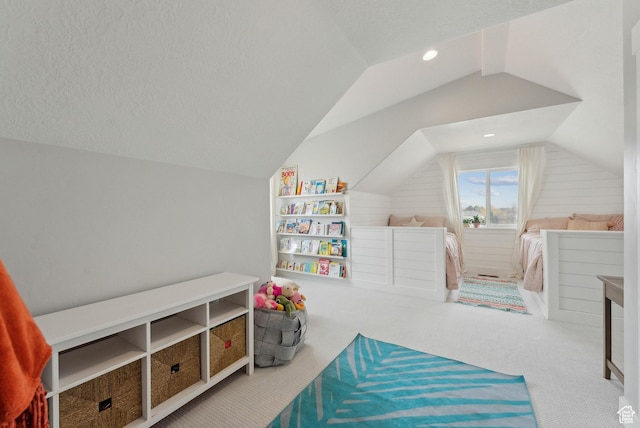 9227 N Horizon Dr, Eagle Mountain, UT 84005 - recreation room featuring vaulted ceiling, carpet floors, and a textured ceiling
