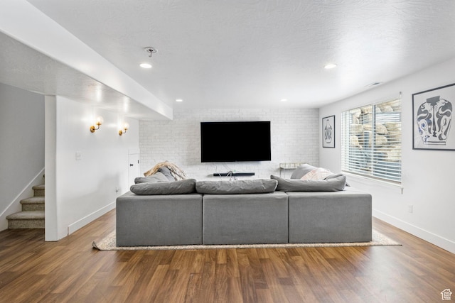 764 E 760 S, Pleasant Grove, UT 84062 - living room featuring baseboards, a textured ceiling, and wood finished floors