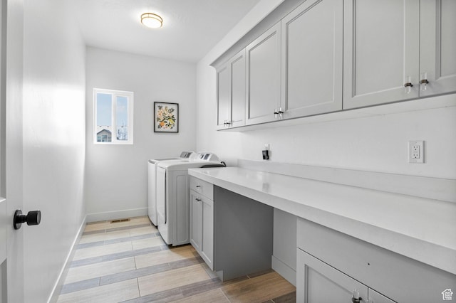 764 E 760 S, Pleasant Grove, UT 84062 - laundry room with baseboards, cabinet space, separate washer and dryer, and wood tiled floor