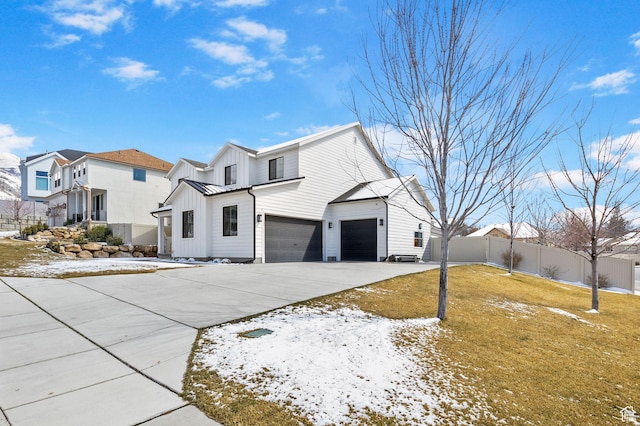 764 E 760 S, Pleasant Grove, UT 84062 - view of front of house with a front yard, fence, concrete driveway, a garage, and metal roof
