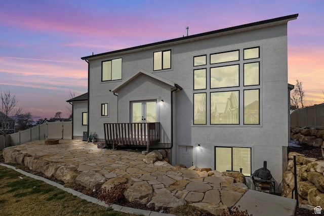 764 E 760 S, Pleasant Grove, UT 84062 - back of property featuring stucco siding, a patio, and french doors