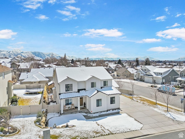 764 E 760 S, Pleasant Grove, UT 84062 - modern farmhouse style home with a gate, a trampoline, a mountain view, a residential view, and fence private yard