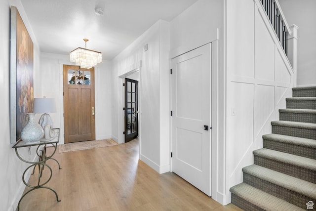 764 E 760 S, Pleasant Grove, UT 84062 - entrance foyer with baseboards, a notable chandelier, stairs, and light wood finished floors