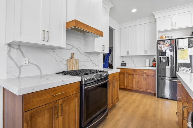 764 E 760 S, Pleasant Grove, UT 84062 - kitchen featuring open shelves, white cabinets, light wood-style floors, and stainless steel appliances