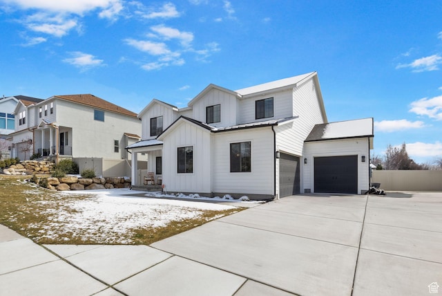 764 E 760 S, Pleasant Grove, UT 84062 - modern farmhouse with a standing seam roof, fence, board and batten siding, concrete driveway, and metal roof