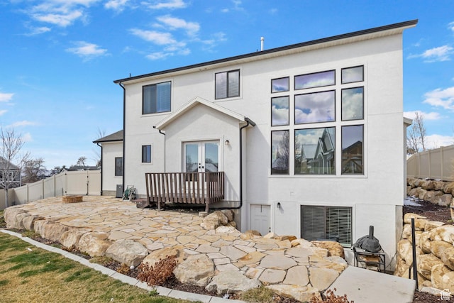 764 E 760 S, Pleasant Grove, UT 84062 - back of house with french doors, a patio area, stucco siding, and fence