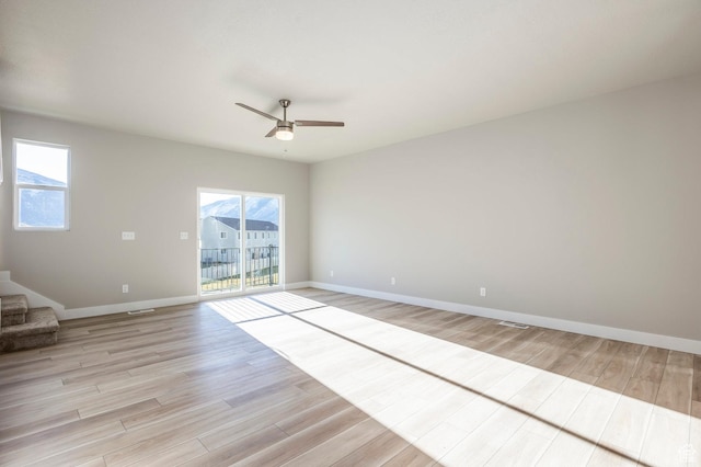 2744 E 1060 S, Spanish Fork, UT 84660 - spare room with visible vents, baseboards, light wood-type flooring, and ceiling fan