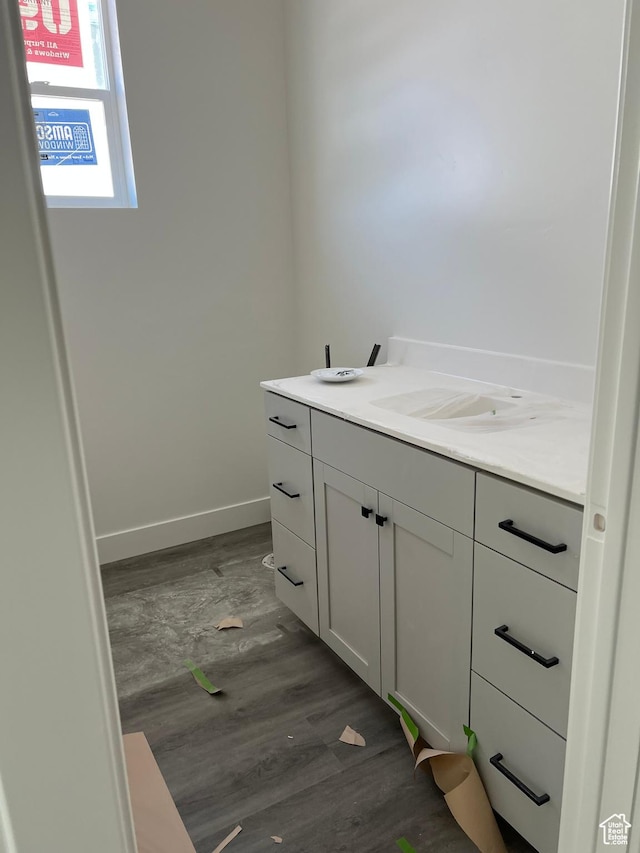 336 W Rosie Loop Unit 45W, Cedar City, UT 84721 - bathroom with wood finished floors, baseboards, and vanity