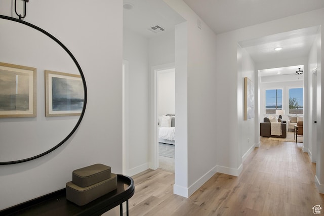 336 W Rosie Loop Unit 45W, Cedar City, UT 84721 - corridor with light wood-style flooring and baseboards
