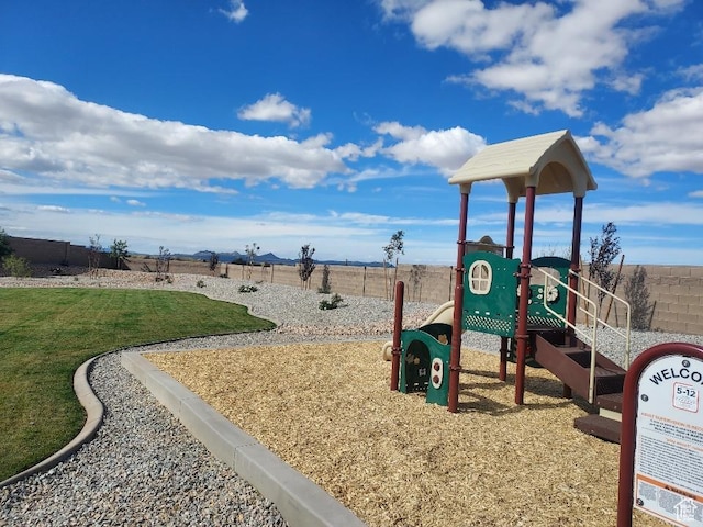 336 W Rosie Loop Unit 45W, Cedar City, UT 84721 - community jungle gym featuring a mountain view