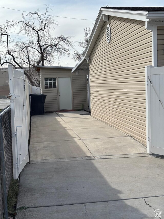 exterior space featuring fence and a gate