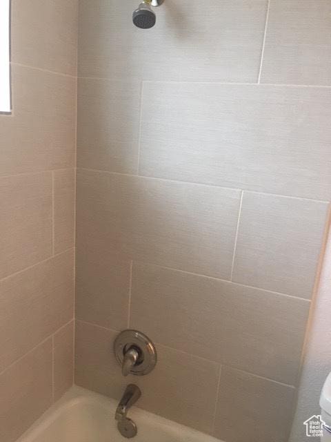 301 W 500 N, Logan, UT 84321 - bathroom featuring washtub / shower combination