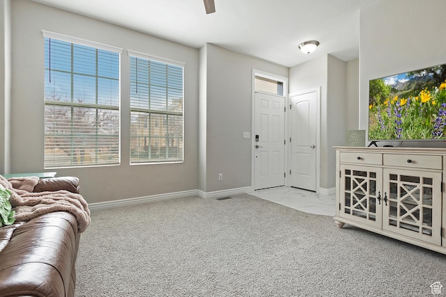 4532 W Cave Run Ln S, South Jordan, UT 84009 - carpeted living area with baseboards and plenty of natural light