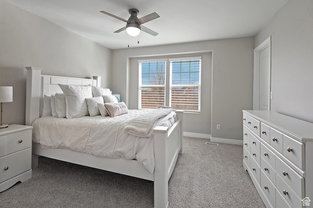 4532 W Cave Run Ln S, South Jordan, UT 84009 - bedroom featuring light colored carpet, a ceiling fan, and baseboards