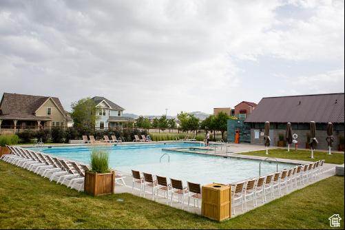 4532 W Cave Run Ln S, South Jordan, UT 84009 - community pool featuring a lawn