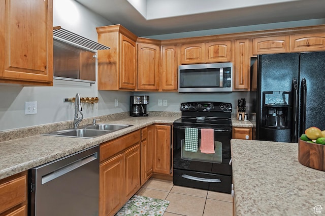 4532 W Cave Run Ln S, South Jordan, UT 84009 - kitchen featuring black appliances, a sink, light countertops, and light tile patterned floors