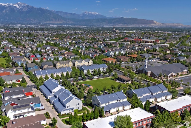 4532 W Cave Run Ln S, South Jordan, UT 84009 - aerial view of property and surrounding area featuring a mountain backdrop and nearby suburban area