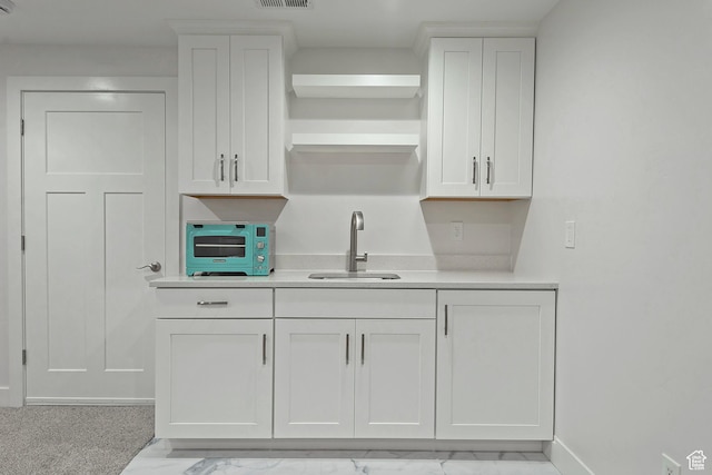 4532 W Cave Run Ln S, South Jordan, UT 84009 - kitchen with a sink, light countertops, open shelves, and white cabinetry