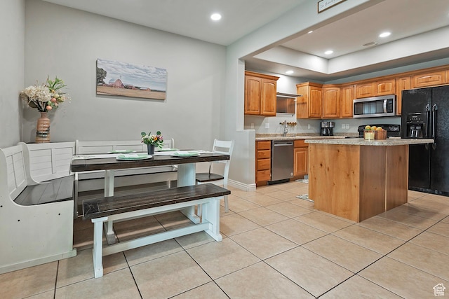 4532 W Cave Run Ln S, South Jordan, UT 84009 - kitchen with appliances with stainless steel finishes, light tile patterned floors, a center island, recessed lighting, and a sink