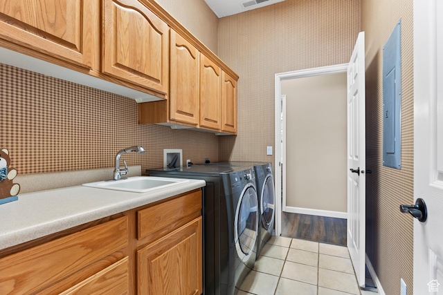 846 S 800 E, New Harmony, UT 84757 - clothes washing area with washer and clothes dryer, a sink, cabinet space, wallpapered walls, and light tile patterned floors