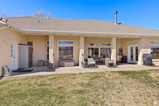 846 S 800 E, New Harmony, UT 84757 - back of property with a patio area, a tiled roof, a yard, and french doors