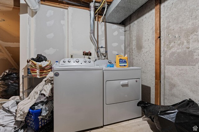 5623 Brandy Wine St, Taylorsville, UT 84118 - clothes washing area featuring laundry area and washing machine and dryer
