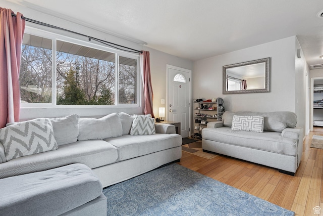 5623 Brandy Wine St, Taylorsville, UT 84118 - living area featuring wood finished floors
