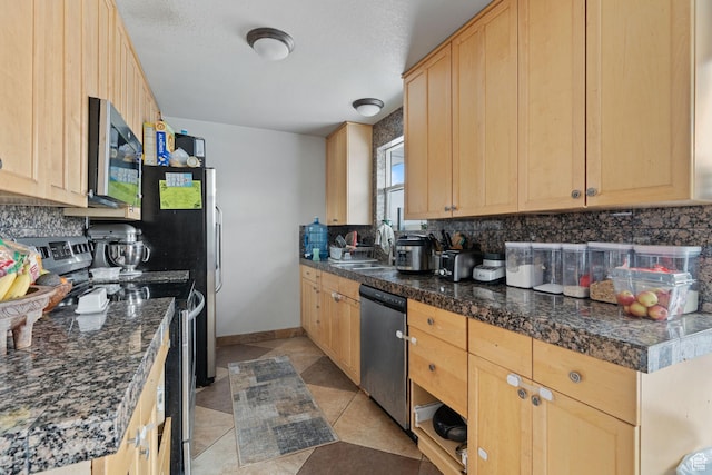 5623 Brandy Wine St, Taylorsville, UT 84118 - kitchen featuring a sink, tasteful backsplash, appliances with stainless steel finishes, and light brown cabinets