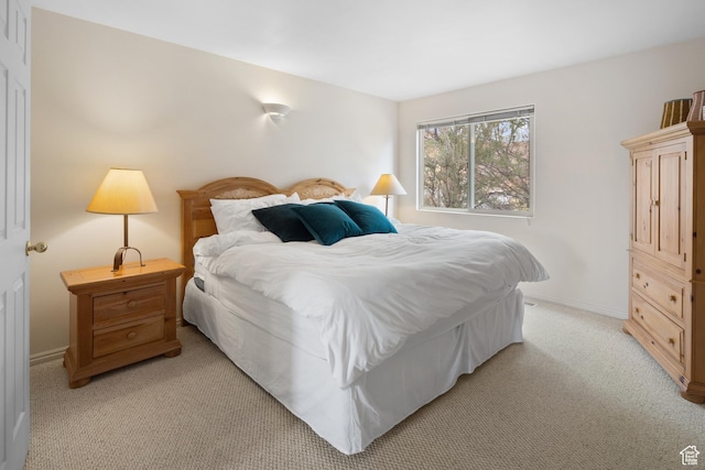 3354 E Fairway Loop, Moab, UT 84532 - bedroom with light carpet and baseboards