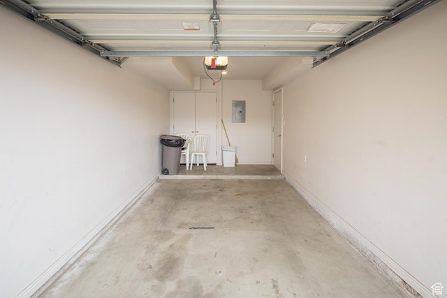 3354 E Fairway Loop, Moab, UT 84532 - garage featuring a garage door opener and electric panel