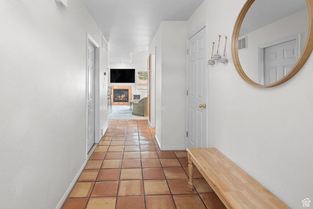 3354 E Fairway Loop, Moab, UT 84532 - hallway featuring light tile patterned floors, baseboards, and visible vents