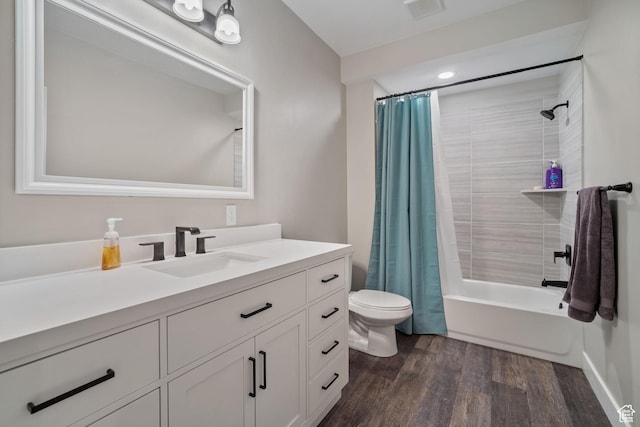 2558 Mountain Glen Rd, Erda, UT 84074 - bathroom featuring toilet, wood finished floors, shower / bathtub combination with curtain, and vanity