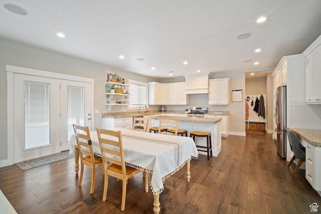 2558 Mountain Glen Rd, Erda, UT 84074 - dining room featuring dark wood-style floors, recessed lighting, and baseboards