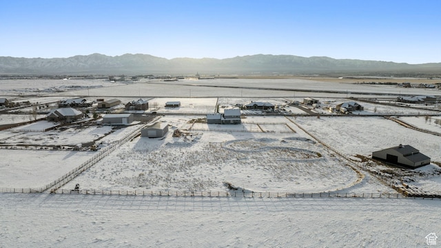 2558 Mountain Glen Rd, Erda, UT 84074 - snowy aerial view featuring a mountain view