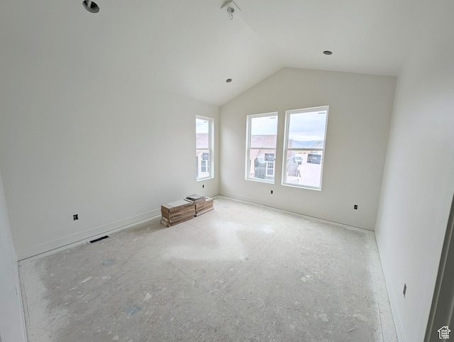 7077 W Granbury Dr S Unit 257, South Jordan, UT 84009 - unfurnished room featuring lofted ceiling and baseboards