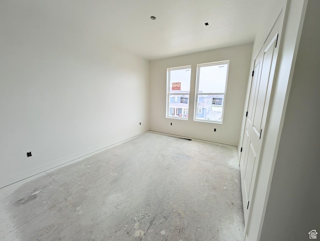 7077 W Granbury Dr S Unit 257, South Jordan, UT 84009 - unfurnished bedroom with unfinished concrete floors