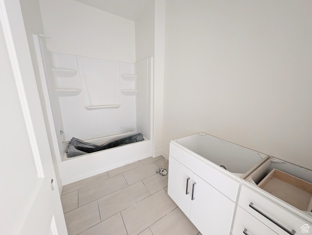 7077 W Granbury Dr S Unit 257, South Jordan, UT 84009 - full bath with tile patterned flooring and baseboards