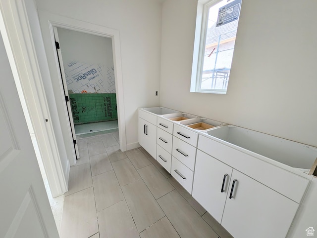 7077 W Granbury Dr S Unit 257, South Jordan, UT 84009 - bathroom featuring tile patterned flooring