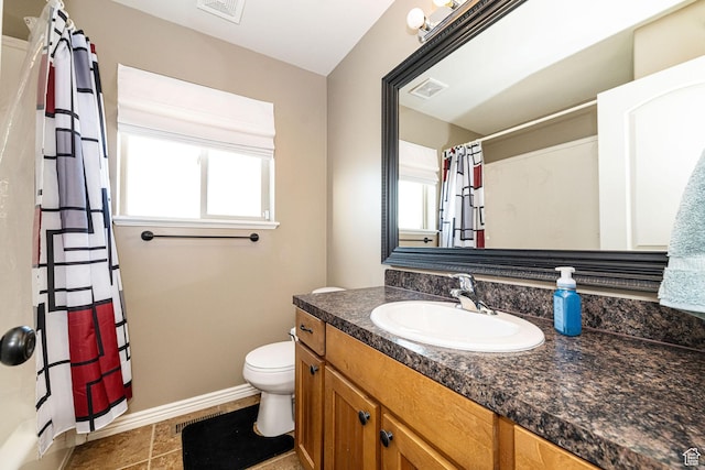 624 N 800 E, Wellsville, UT 84339 - bathroom with healthy amount of natural light, baseboards, toilet, and vanity