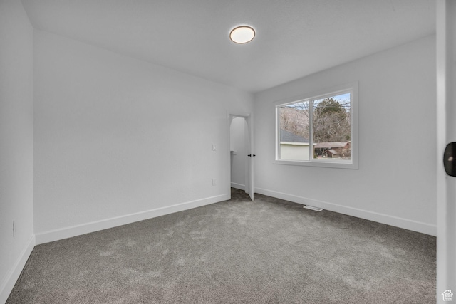 590 E 7th St, Ogden, UT 84404 - carpeted empty room with baseboards